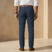 FJØRNA men's linen blend straight-leg trousers showing tailored fit and classic design in neutral fabric