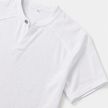 Men's FJØRNA linen short sleeve Henley T-shirt in light fabric, featuring a buttoned neckline and casual fit.