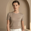 Slim fit men's T-shirt from FJØRNA, casual top with a comfortable fit, shown in a neutral color.