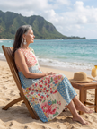 FJØRNA women's floral summer midi dress with short sleeves, flowy fabric, perfect for warm weather and casual outings.
