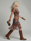 FJØRNA women's summer midi dress with short sleeves and ruched design, perfect for warm-weather casual wear.