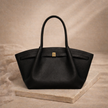 FJØRNA leather medium work tote bag with sturdy handles and spacious interior, stylish for daily use and professional settings.