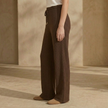 FJØRNA women's knit lounge trousers with cable knit pattern, cozy and stylish pants for comfortable wear.
