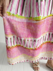 FJØRNA women's summer midi dress with striped pattern, long sleeves, flowy relaxed fit, perfect for warm weather wear.