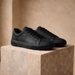 Men's leather trainers by FJØRNA, stylish casual shoes with sleek design and durable leather material for everyday wear.
