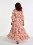 FJØRNA women's floral ruffle summer maxi dress, flowing fabric with vibrant floral patterns and ruffled details.