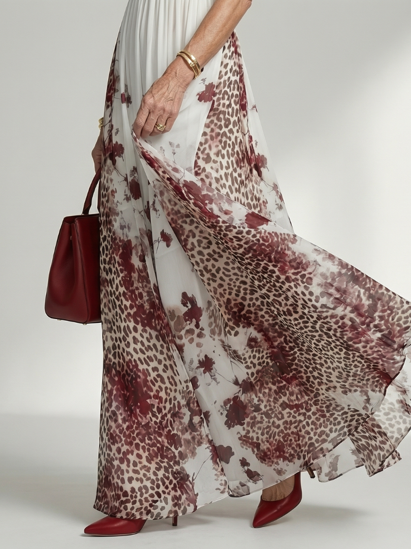 FJØRNA women's floral summer maxi dress with V-neck and long sleeves, lightweight and flowy for warm weather wear.