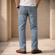Men’s lightweight casual straight leg jeans by FJØRNA, showing a classic denim style with a relaxed fit and modern design.