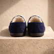 FJØRNA men's wool slippers with soft fabric exterior and cozy interior, perfect for indoor comfort and warmth.
