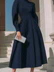 FJØRNA high-neck pinstripe midi dress for women featuring a structured waist and elegant design, perfect for formal occasions.