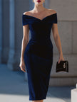 Navy velvet off-shoulder bodycon midi dress by FJØRNA featuring a fitted silhouette and elegant off-shoulder neckline.