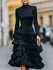 FJØRNA elegant mock neck tiered ruffle midi dress for women, showcasing a flowing design with layered ruffles and a fitted bodice.