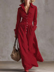 FJØRNA high waisted maxi dress with long sleeves, button details, pleated pockets, solid color, split-joint lapel design.