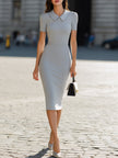 Light gray Peter Pan collar puff sleeve bodycon midi dress by FJØRNA, showcased on a model with detailed collar and fitted silhouette.