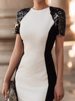 FJØRNA sculpted contrast panel short sleeve evening dress for women, featuring a fitted design and elegant style.