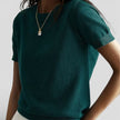 Women's FJØRNA knit top in wool blend, comfortable classic fit, long-sleeve shirt with a cozy, stylish appearance.