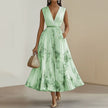 FJØRNA women's white sleeveless pleated dress with printed V-neck design, lightweight and fashionable for summer wear.
