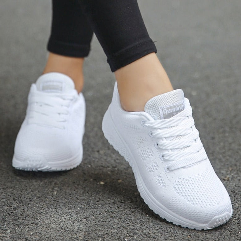 FJØRNA Brielle orthopedic walking shoes for women, stylish sneakers with supportive design and cushioned soles.