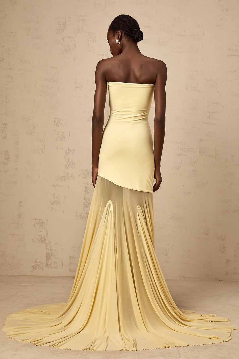 FJØRNA Josiane yellow off-shoulder sheer tulle maxi dress, flowing dress with off-shoulder design and delicate fabric.