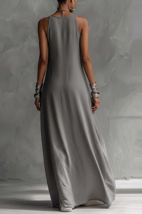 Color-blocked round neck sleeveless casual maxi dress with pockets by FJØRNA, featuring a loose fit and vibrant design.