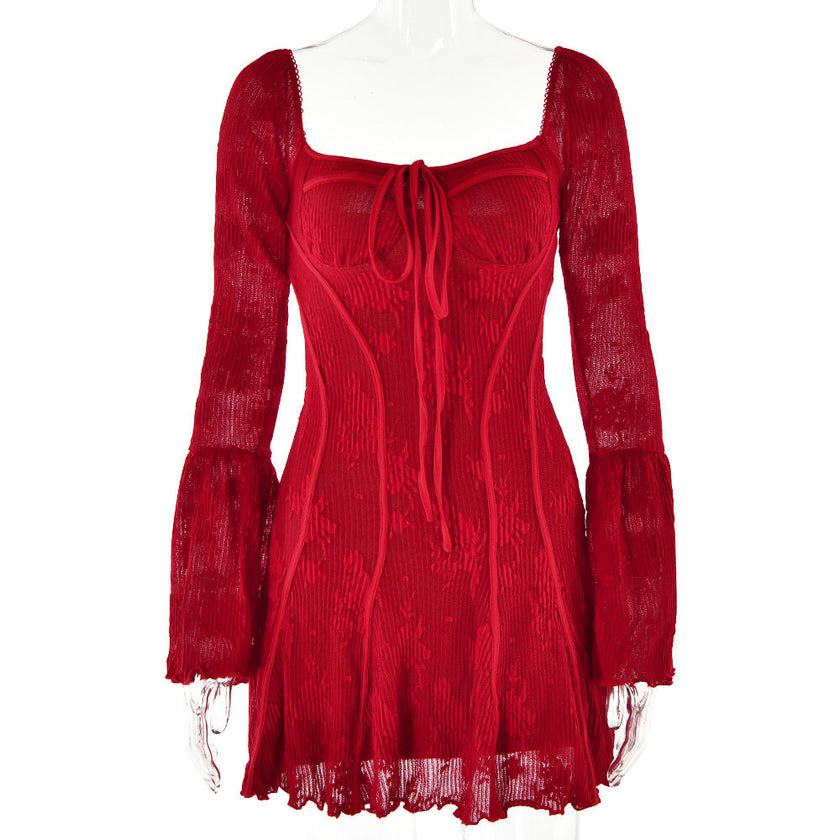 White FJØRNA Sleeve Lace Mini Dress showing intricate lace details and fitted silhouette on model.