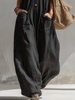 Black cotton linen sleeveless jumpsuit for women by FJØRNA, featuring a relaxed fit and stylish design.