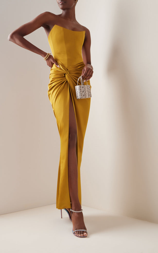 FJØRNA draped strapless satin maxi dress with flowing fabric and elegant design, perfect for formal occasions.