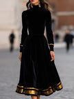 FJØRNA elegant velvet midi dress with gold trim, featuring a fitted silhouette and sophisticated design.