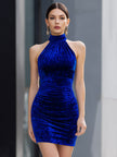 Royal blue velvet halter bodycon mini dress by FJØRNA, featuring a fitted silhouette and elegant halter neckline.