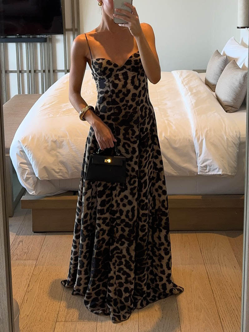 FJØRNA women's leopard print maxi dress with elegant strappy design, perfect for stylish occasions.
