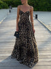 FJØRNA elegant leopard print women's maxi dress with strappy details, flowing fabric, and stylish design for fashionable occasions.