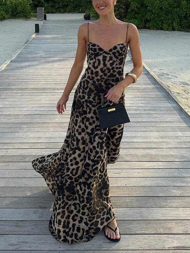 FJØRNA elegant leopard print maxi dress with strappy design, perfect for stylish women’s summer or evening wear.
