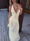 FJØRNA women's halterneck lace-up deep V-neck backless maxi dress, elegant evening dress with flowing fabric and stylish design.