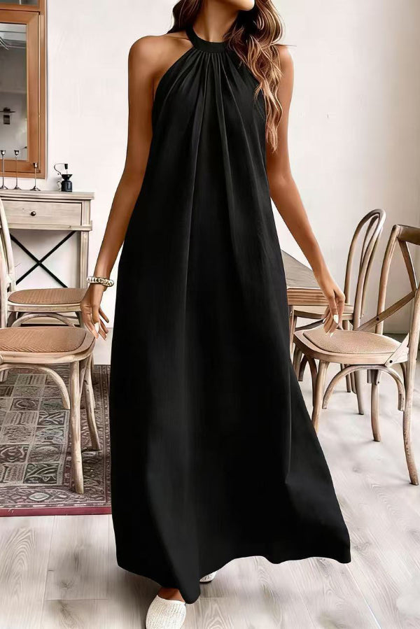 FJØRNA solid color loose halter neck backless casual maxi dress, perfect for weddings or casual occasions, shown in a relaxed fit style.