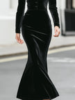 FJØRNA velvet long-sleeve mermaid dress with button details, fitted silhouette, and elegant design for women.