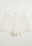 Women's boho beach shorts with elastic waistband by FJØRNA, featuring lightweight fabric and relaxed fit for summer beachwear.