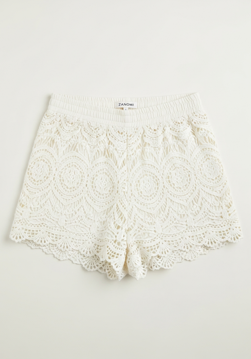 Women's boho beach shorts with elastic waistband by FJØRNA, featuring lightweight fabric and relaxed fit for summer beachwear.