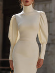 FJØRNA white cream turtleneck puff-sleeve fitted midi dress, bodycon style, shown on a model with a sleek silhouette.