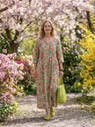 FJØRNA women's floral summer midi dress with long sleeves, wrap style, relaxed fit, perfect for warm-weather occasions.