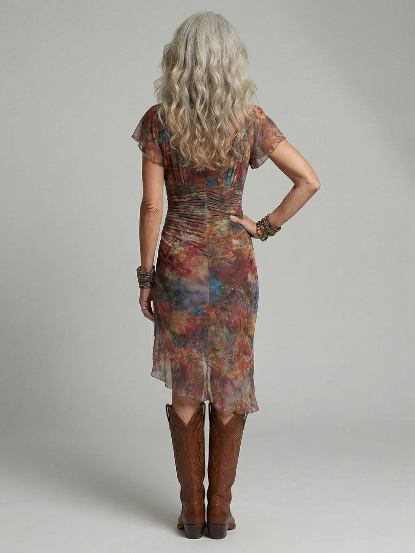 FJØRNA women's summer midi dress with halter neck and short sleeves, lightweight and stylish for warm weather.