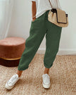 FJØRNA lightweight women's summer trousers with high waist, straight leg fit, and front pockets, shown in a neutral color.