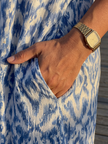 FJØRNA women's summer midi dress with geometric pattern, short sleeves, and wrap design, perfect for warm weather.