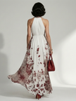 FJØRNA floral summer maxi dress for women with long sleeves and pleated design, flowing and lightweight for warm weather.