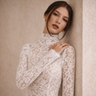 Ivory lace midi dress for women with high neck by FJØRNA, featuring elegant lace fabric and a sophisticated midi length.