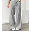 FJØRNA women's lightweight summer trousers with drawstring waist, breathable fabric, and side pockets for casual comfort.