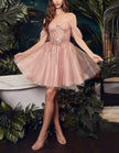 Pink tulle cocktail dress for women by FJØRNA, featuring a fitted bodice and flowing skirt for elegant evening wear.
