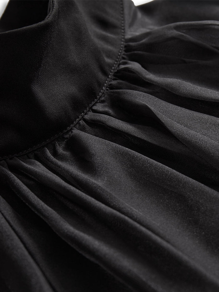 Black chiffon blouse for women, high neck sleeveless top by FJØRNA with elegant, flowy fabric and sleeveless design.