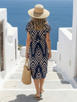 FJØRNA women's summer midi dress with geometric print and short sleeves, stylish and lightweight for warm weather.