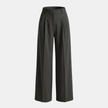 FJØRNA women's high waist wide leg pleated trousers, stylish pants with a relaxed fit and flowing silhouette, shown on a model.