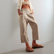Women’s wide leg denim trousers by FJØRNA, showcasing classic blue jeans with a relaxed fit and stylish design.